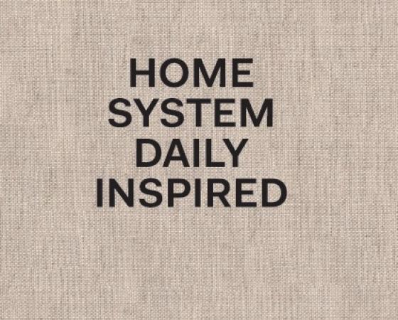 Обложка книги с текстом 'HOME SYSTEM DAILY INSPIRED', год издания 2022.
