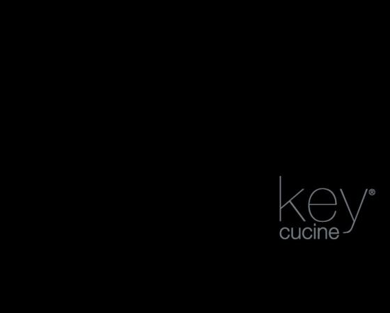 Обложка каталога Key Cucine с надписью 'UNA ad UNA'.